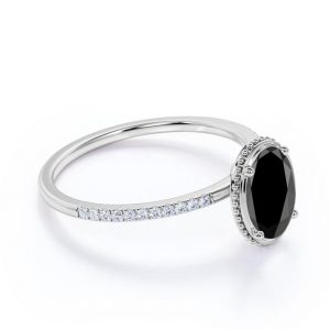1.22 Ct Oval Shape 4 Prong Channel Setting Black And White Diamond Ring