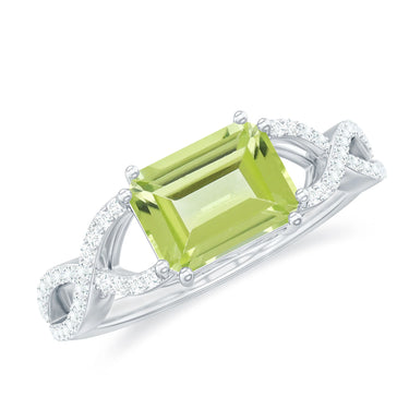 2.20 Carat Emerald Cut Prong Setting Peridot Gemstone Twisted Engagement Ring In White Gold