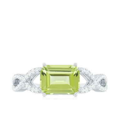 2.20 Carat Emerald Cut Prong Setting Peridot Gemstone Twisted Engagement Ring In White Gold