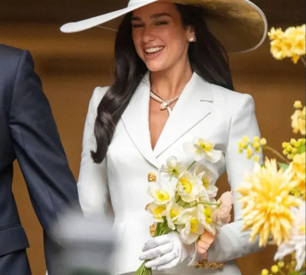 Dua Lipa’s Wedding Look How Her Schiaparelli Skirt Suit Redefined Modern Bridal Fashion