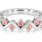 Close Up View Of 0.25 Carat Concertina Pink Diamond Wedding Ring