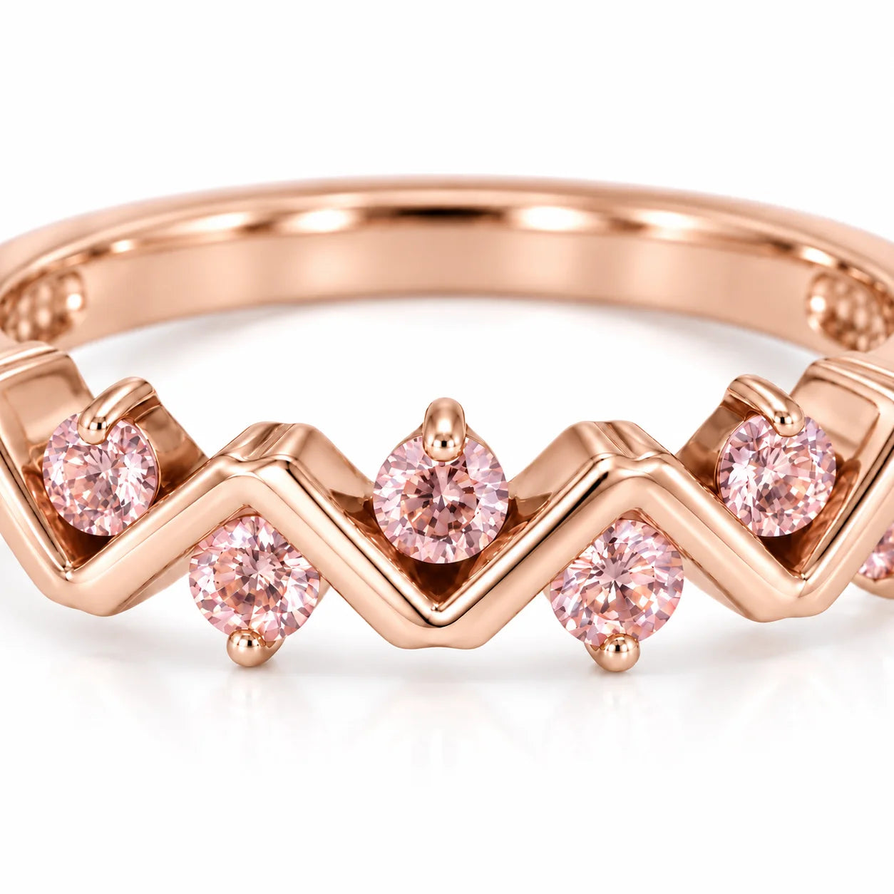 Close Up View Of 0.25 Carat Concertina Pink Diamond Wedding Ring