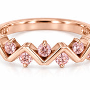Close Up View Of 0.25 Carat Concertina Pink Diamond Wedding Ring