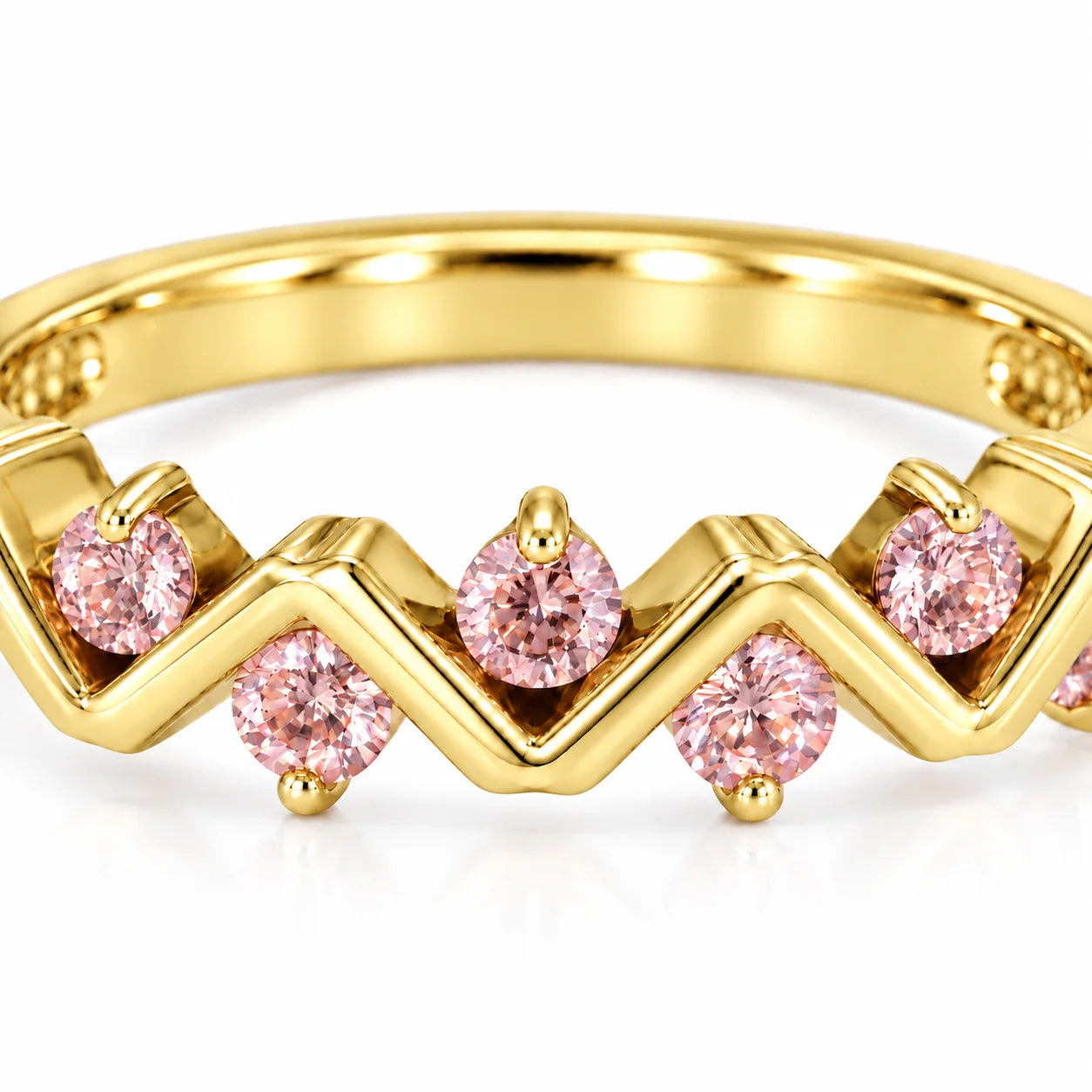 Close Up View Of 0.25 Carat Concertina Pink Diamond Wedding Ring