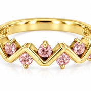 Close Up View Of 0.25 Carat Concertina Pink Diamond Wedding Ring