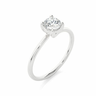 0.55 Ct Round Cut Solitaire Prong Set Diamond Engagement Ring In White Gold