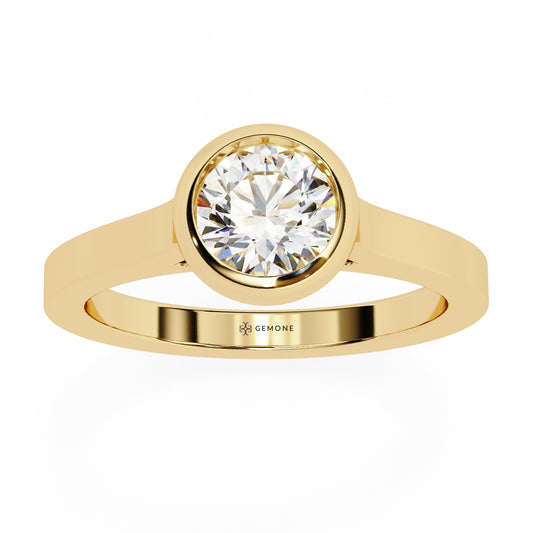 0.65 Carat Round Cut Bazel Set Solitaire Diamond Engagement Ring In Yellow Gold