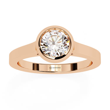 0.65 Carat Round Cut Bazel Set Solitaire Diamond Engagement Ring In Rose Gold