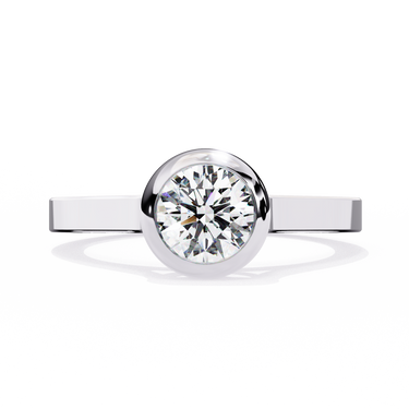 0.65 Carat Round Cut Bazel Set Solitaire Diamond Engagement Ring In White Gold