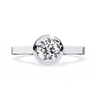 0.65 Carat Round Cut Bazel Set Solitaire Diamond Engagement Ring In White Gold