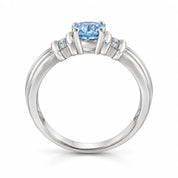0.69 Carat Oval Cut Blue Diamond Ring