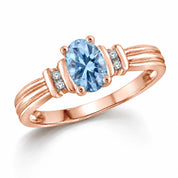 0.69 Carat Oval Cut Blue Diamond Ring