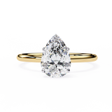 0.90 Carat Pear Shape 4 Prong Set Solitaire Diamond Engagement Ring In Yellow Gold