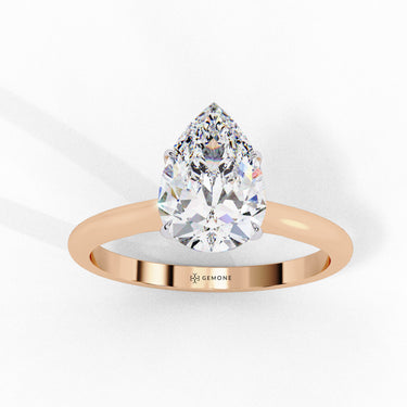 0.90 Carat Pear Shape Solitaire Diamond Engagement Ring In Rose Gold