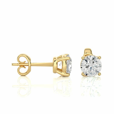 Boucles d'oreilles à tige avec diamant serti griffes solitaire 1,05 ct en or jaune 