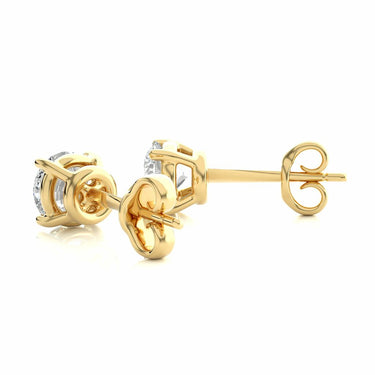 Boucles d'oreilles à tige avec diamant serti griffes solitaire 1,05 ct en or jaune 