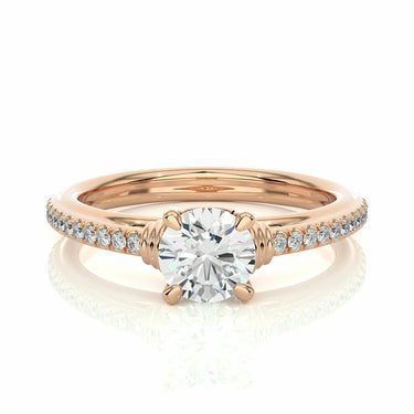 1.30 Ct Round Shaped Prong Setting Moissanite Ring With Accents In Rose Gold 