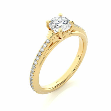 1.30 Ct Round Shaped Prong Setting Moissanite Ring With Accents In Yellow Gold 
