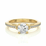 1.30 Ct Round Shaped Prong Setting Moissanite Ring With Accents In Yellow Gold 