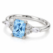 angled view of 1.34 Carat Radiant Cut Diamond Ring with Marquise and Round Diamonds