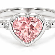 Close up View Of 1.72 Carat Fancy Pink Heart Cut 3 Stone Diamond Ring