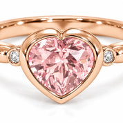 Close UP Of View Of 1.72 Carat Fancy Pink Heart Cut 3 Stone Diamond Ring