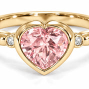 Close Up View Of 1.72 Carat Fancy Pink Heart Cut 3 Stone Diamond Ring