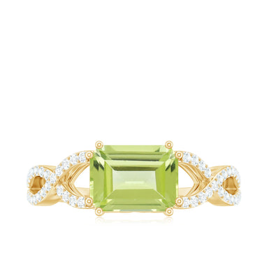 2.20 Carat Emerald Cut Prong Setting Peridot Gemstone Twisted Engagement Ring In Yellow Gold
