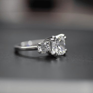 2.80 Ct Cushion Cut Prong Set Moissanite 3 Stone Engagement Ring In White Gold
