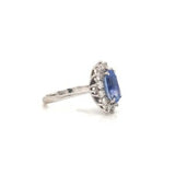 5.50 Ct Oval Shape Prong Setting Halo Sapphire Ring