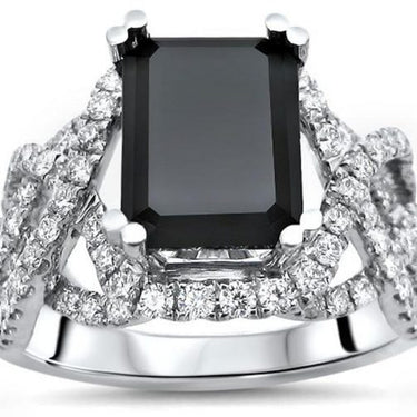 5.50 Carat Emerald Shape Prong Setting Twisted Black and White Diamond Ring