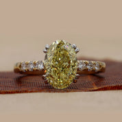 Front View of 3.45ct Oval Fancy Yellow Diamond Ring with Accents