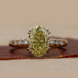 3.45ct Oval Fancy Yellow Diamond Ring with Accents
