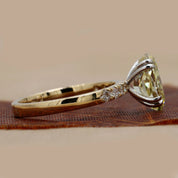 Side view of 3.45ct Oval Fancy Yellow Diamond Ring with Accents