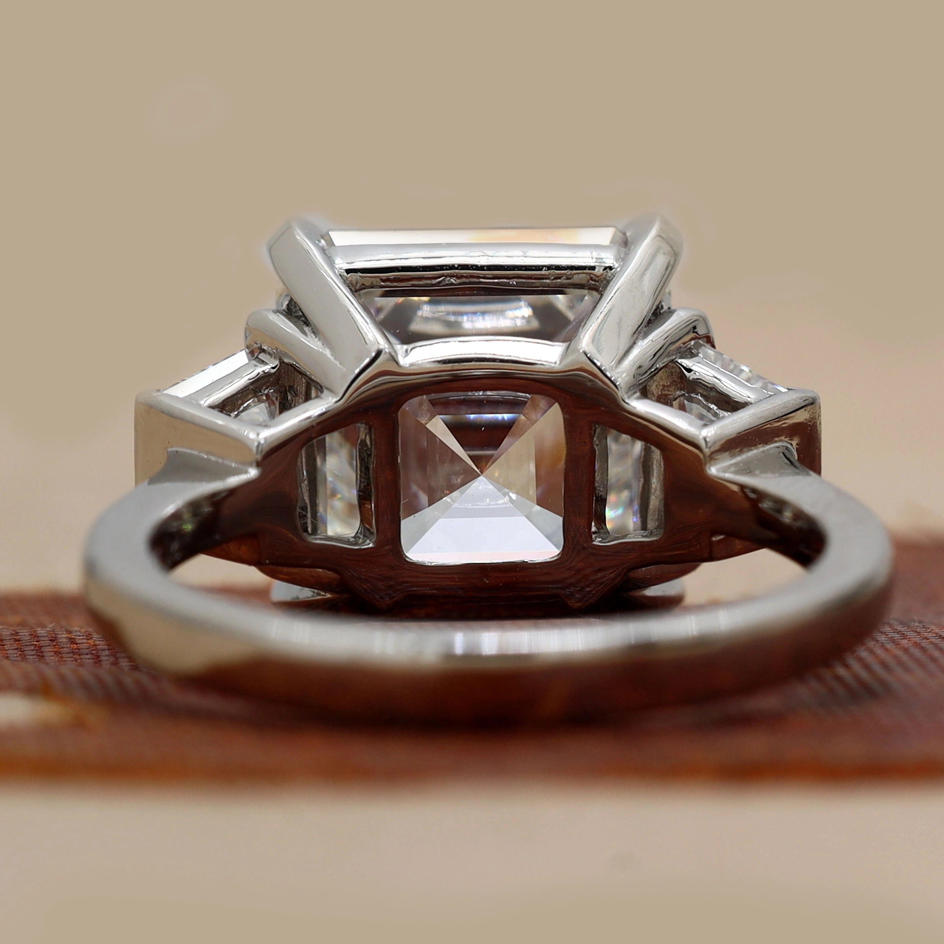 Back View Of 6.84 Ct Asscher Cut Three Stone Diamond Engagement Ring with Step-Cut Side Stones