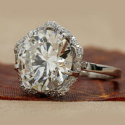 Angled View Of 7.28 Ct Round Brilliant Vintage Scalloped Halo Ring