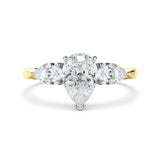 Pear Cut Three Stone Diamond Ring in Yellow Gold