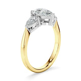 Pear Cut Three Stone Diamond Ring in Yellow Gold