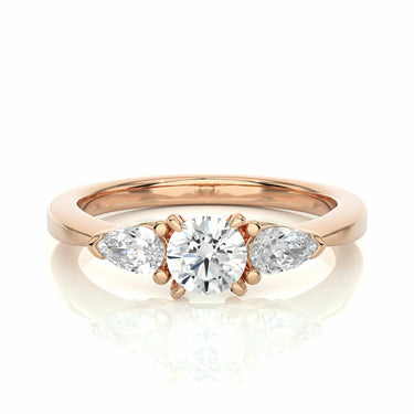 1 Carat Pear And Round Shape Three Stone Prong Set Diamond Ring in Yellow Gold