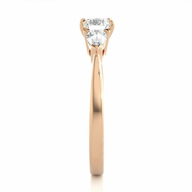 1 Carat Pear And Round Shape Three Stone Prong Set Diamond Ring in Rose Gold