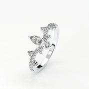 Angled View Of 0.56 carat Pear Cut Tiara Style Diamond Promise Ring 