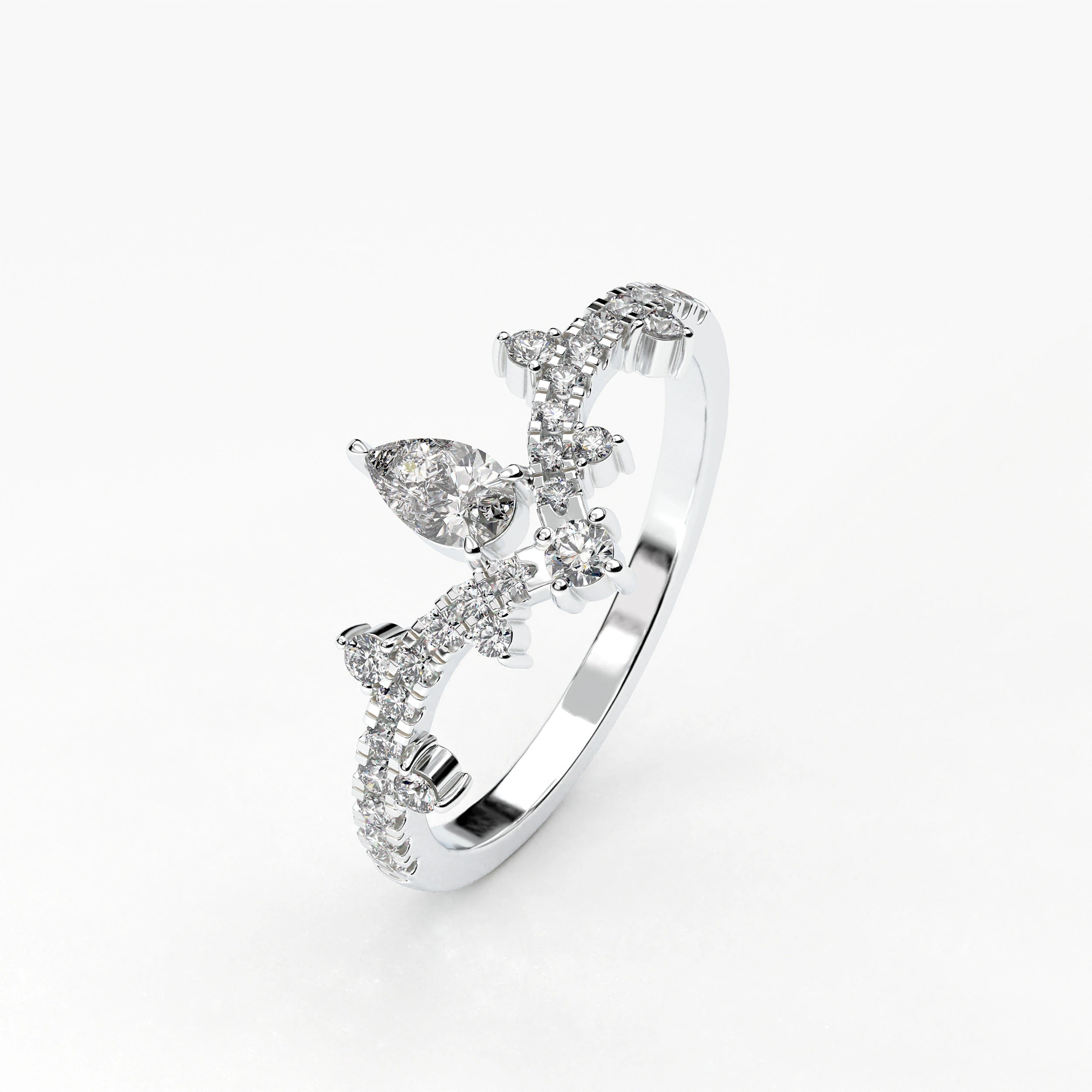 Angled View Of 0.56 carat Pear Cut Tiara Style Diamond Promise Ring 