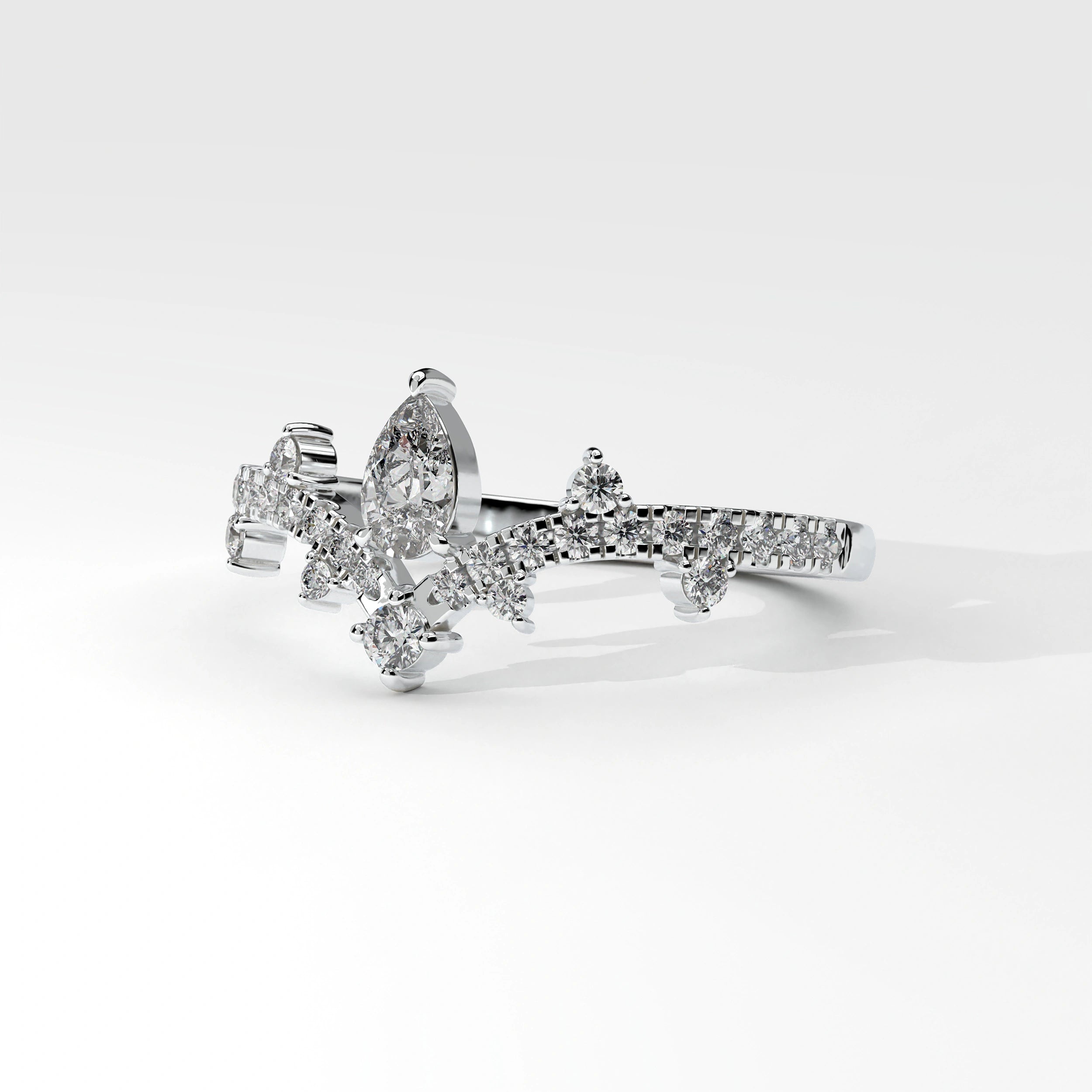 Side View Of 0.56 carat Pear Cut Tiara Style Diamond Promise Ring 