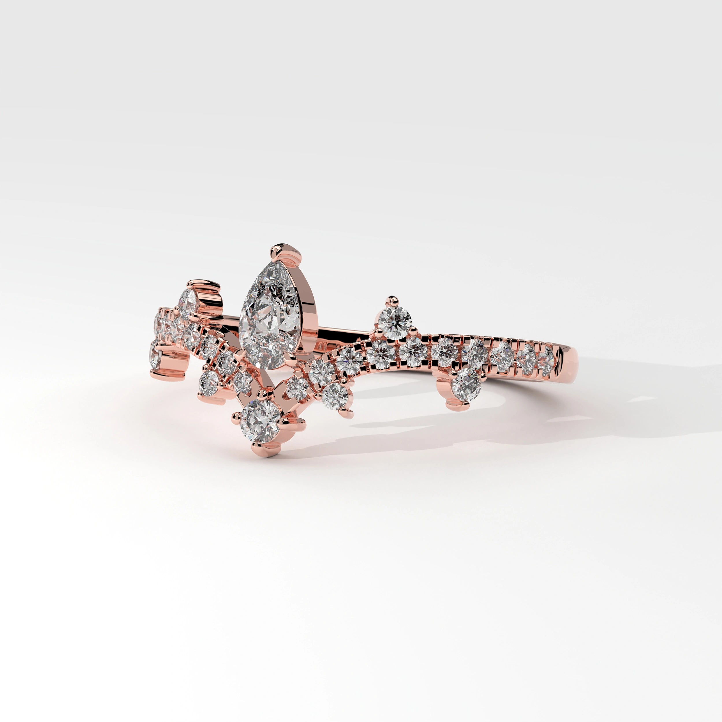 Side View Of 0.56 carat Pear Cut Tiara Style Diamond Promise Ring 
