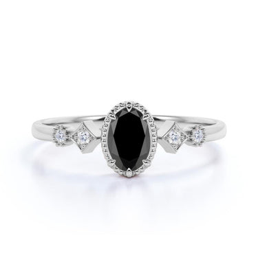 2 Carat Oval And Round Shaped 5 Stone Prong Set Black And White Diamond Ring