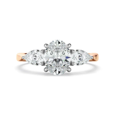 2 Carat Oval And Pear Cut Prong Setting Lab Diamond Three Stone Ring in Rose Gold